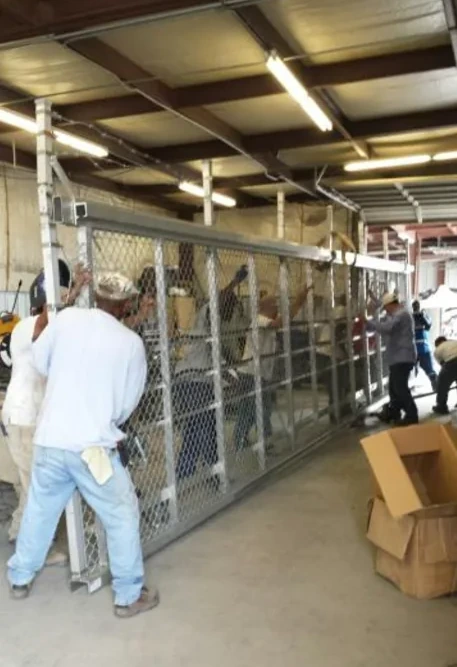 Workers in the Hinds fabrication and fencing shop